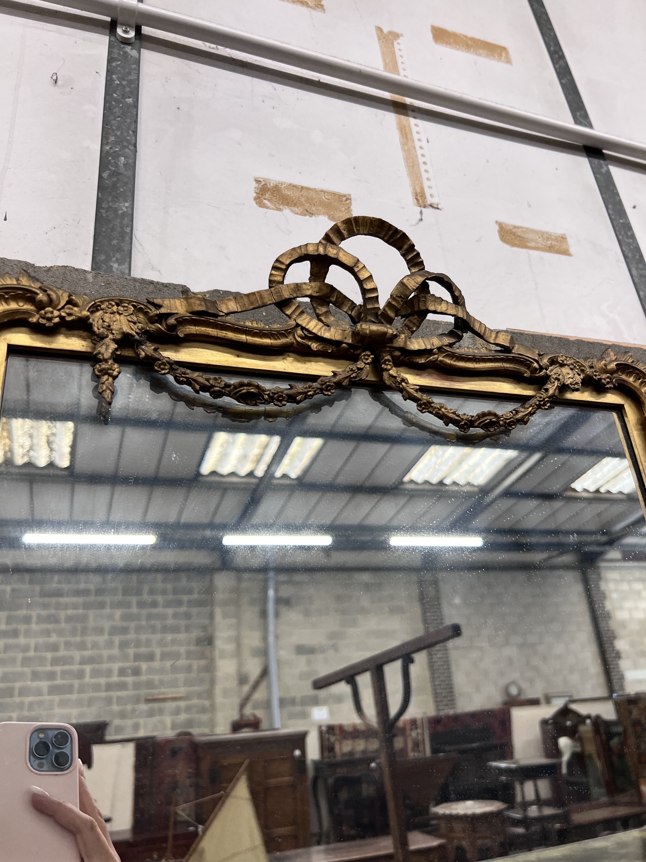 Two similar Louis XVI style giltwood and composition mirrors, width 50cm, height 62cm